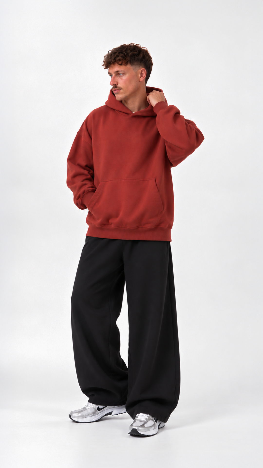 Essential Oversize Hoodie — Brick Red, front styling view
